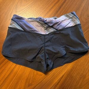 Lululemon run shorts size zero. Interior lining, zipper and hidden pockets.